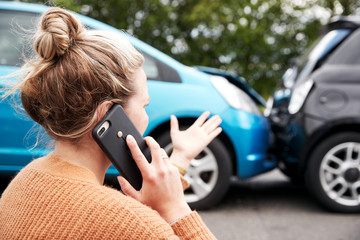 lady on phone after a accident