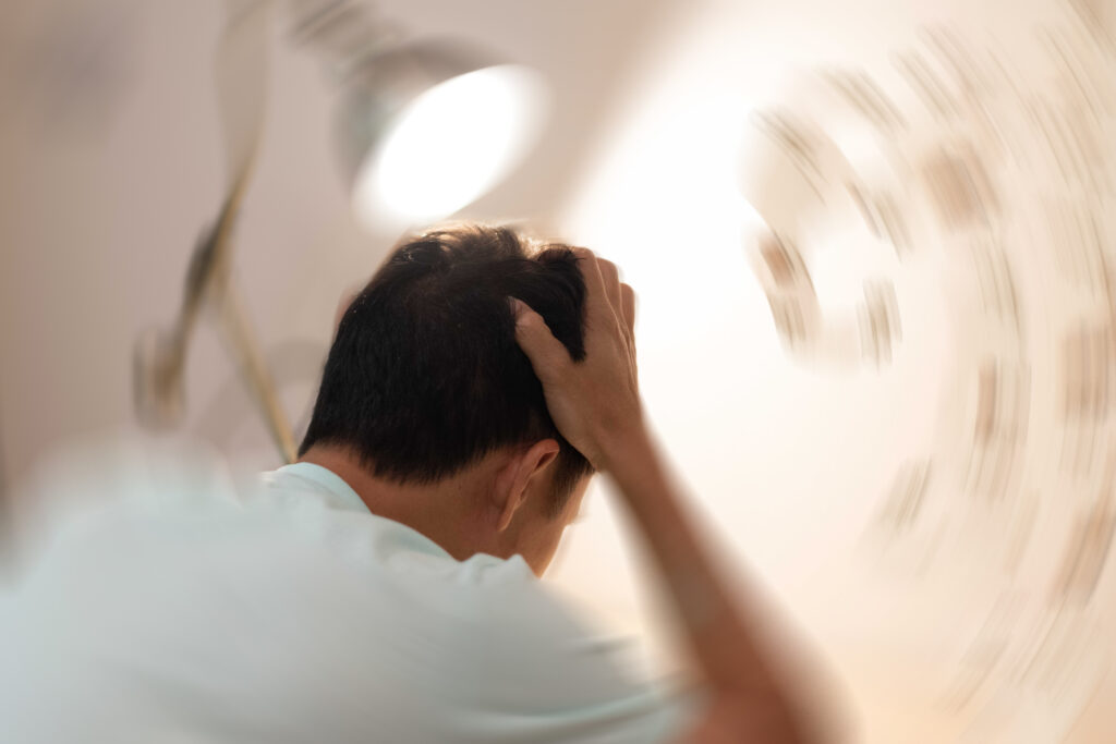 man with a headache after a car accident