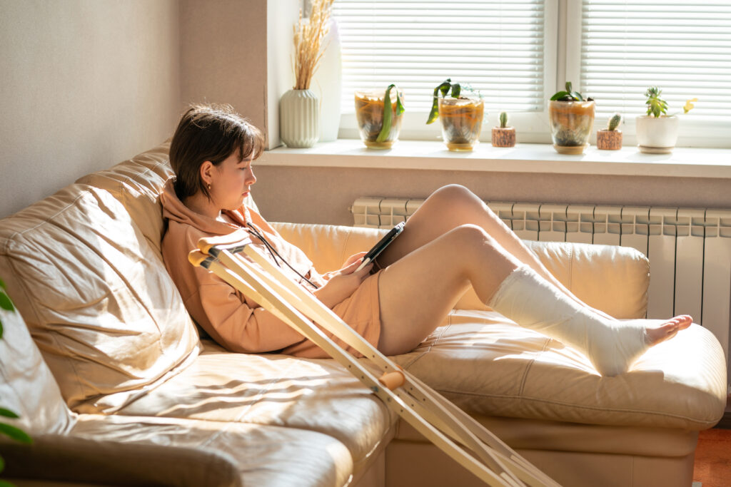 Girl with a cast on her leg from a premises liability injury