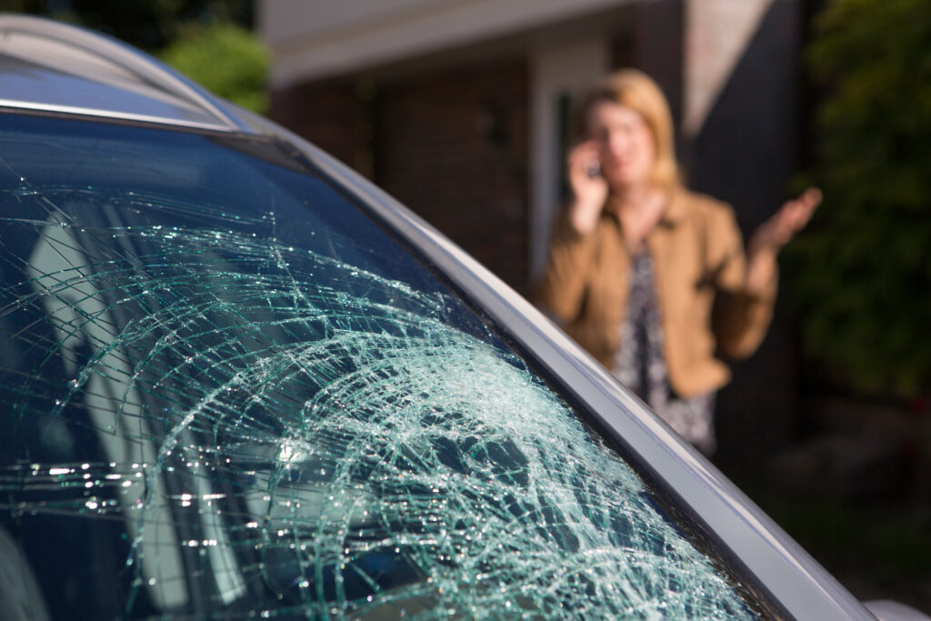 car accident in Laurel MD, woman phoning for help