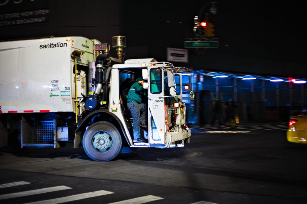 garbage truck at night