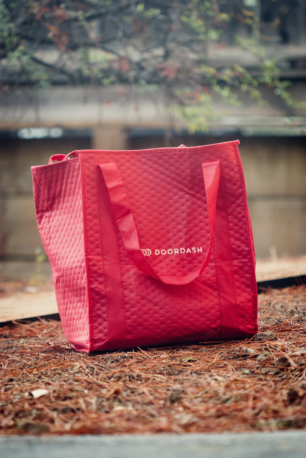 doordash delivery bag on the ground, doordash accident theme bodily injury liability